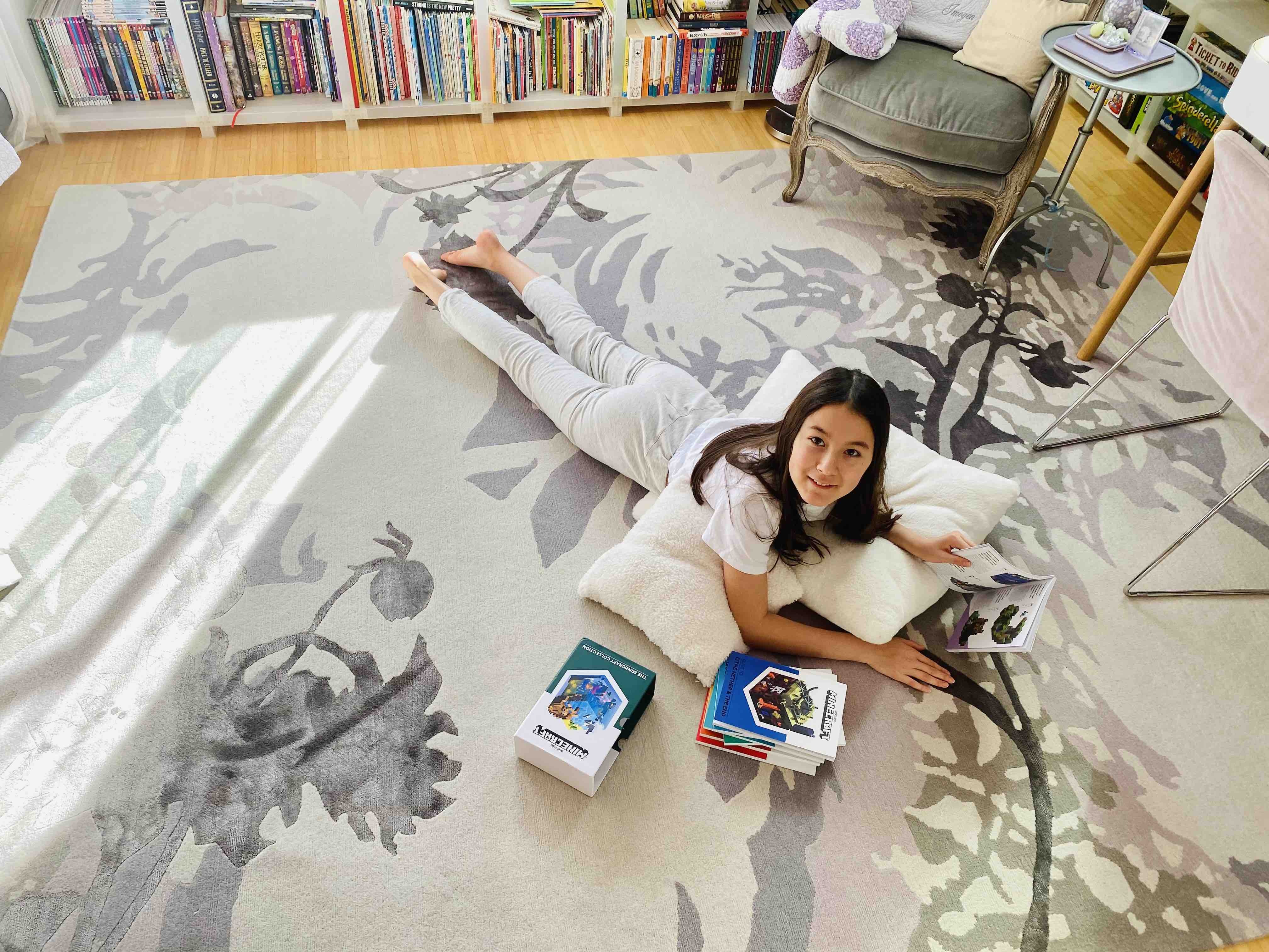 Imogen reading new rug